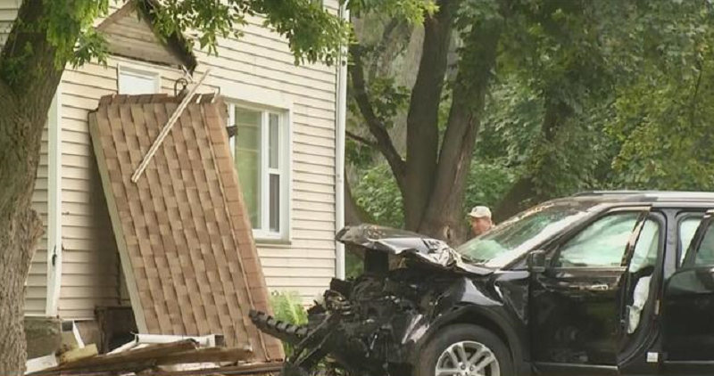 SUV crashes into pole, house in Penfield