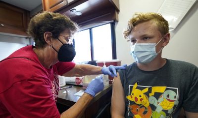 US health officials call for booster shots against COVID-19