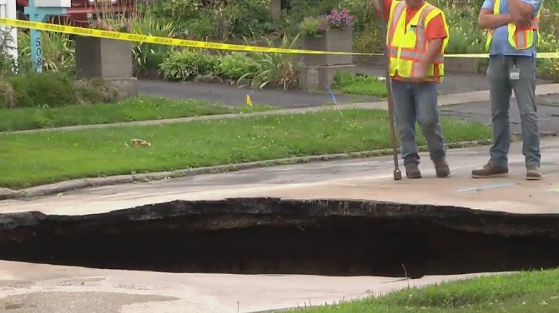 East Rochester Street is closed due to a massive sinkhole East Rochester Street is closed due to a massive sinkhole